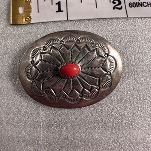 Vintage Navajo oval brooch, approximately 2 inches in diameter.